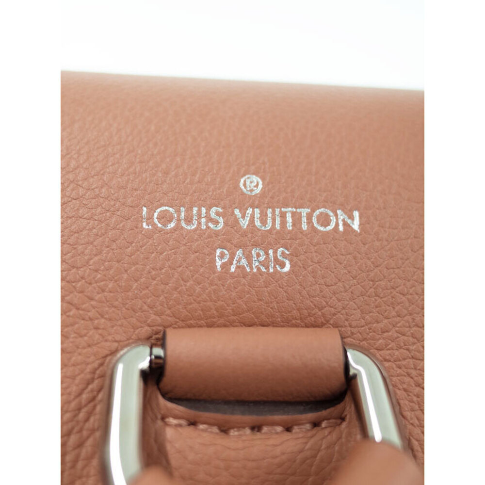 Louis Vuitton Lock Me Backpack - Picture 9 of 9